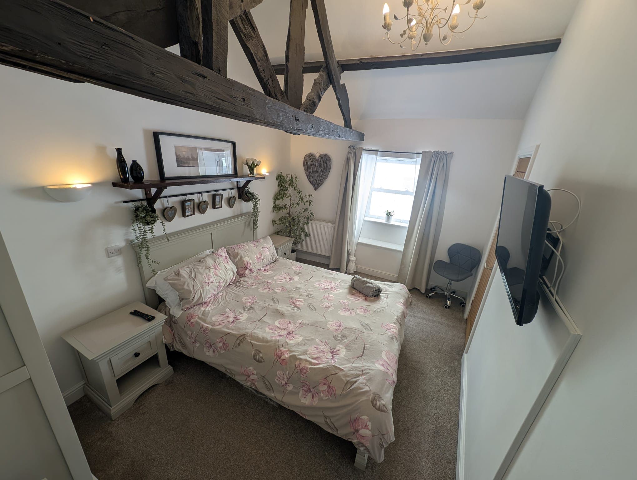 Master bedroom with original 18th-century exposed beams